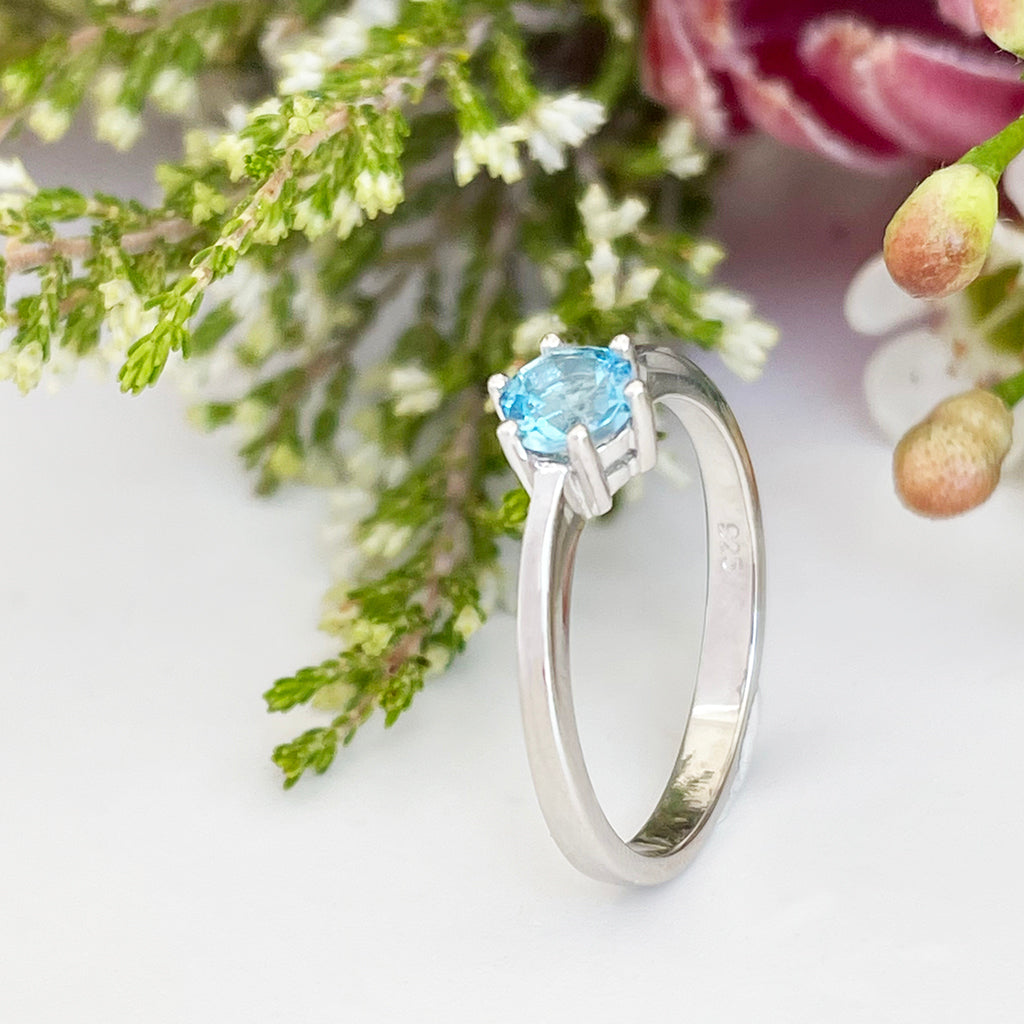 Silver Solitaire Six Claw Blue Topaz Ring