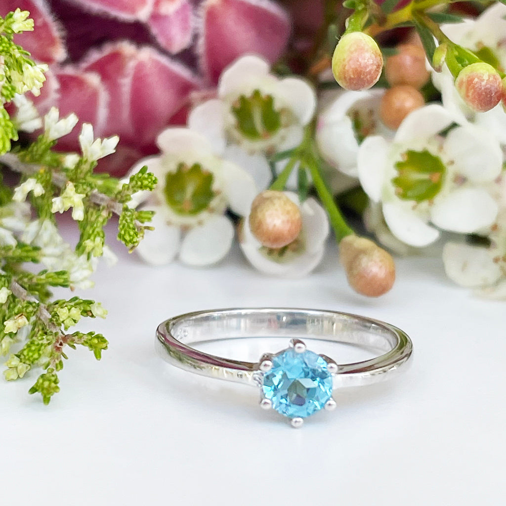 Silver Solitaire Six Claw Blue Topaz Ring