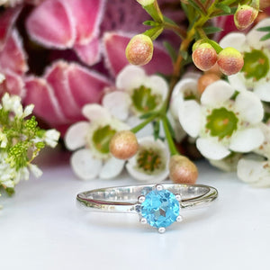 Silver Solitaire Six Claw Blue Topaz Ring