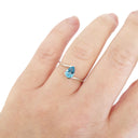 Silver Swish Pear Cut Blue Topaz Ring