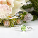Silver Swish Pear Cut Peridot Ring