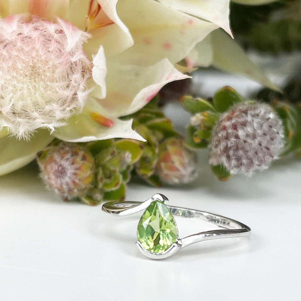 Silver Swish Pear Cut Peridot Ring
