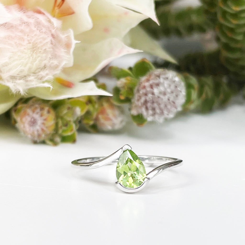 Silver Swish Pear Cut Peridot Ring