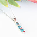 Silver Three Bar Pendant set with Blue Topaz