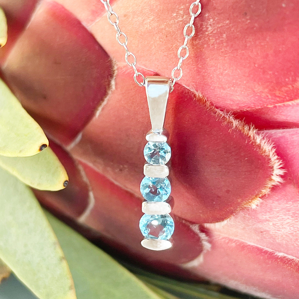 Silver Three Bar Pendant set with Blue Topaz