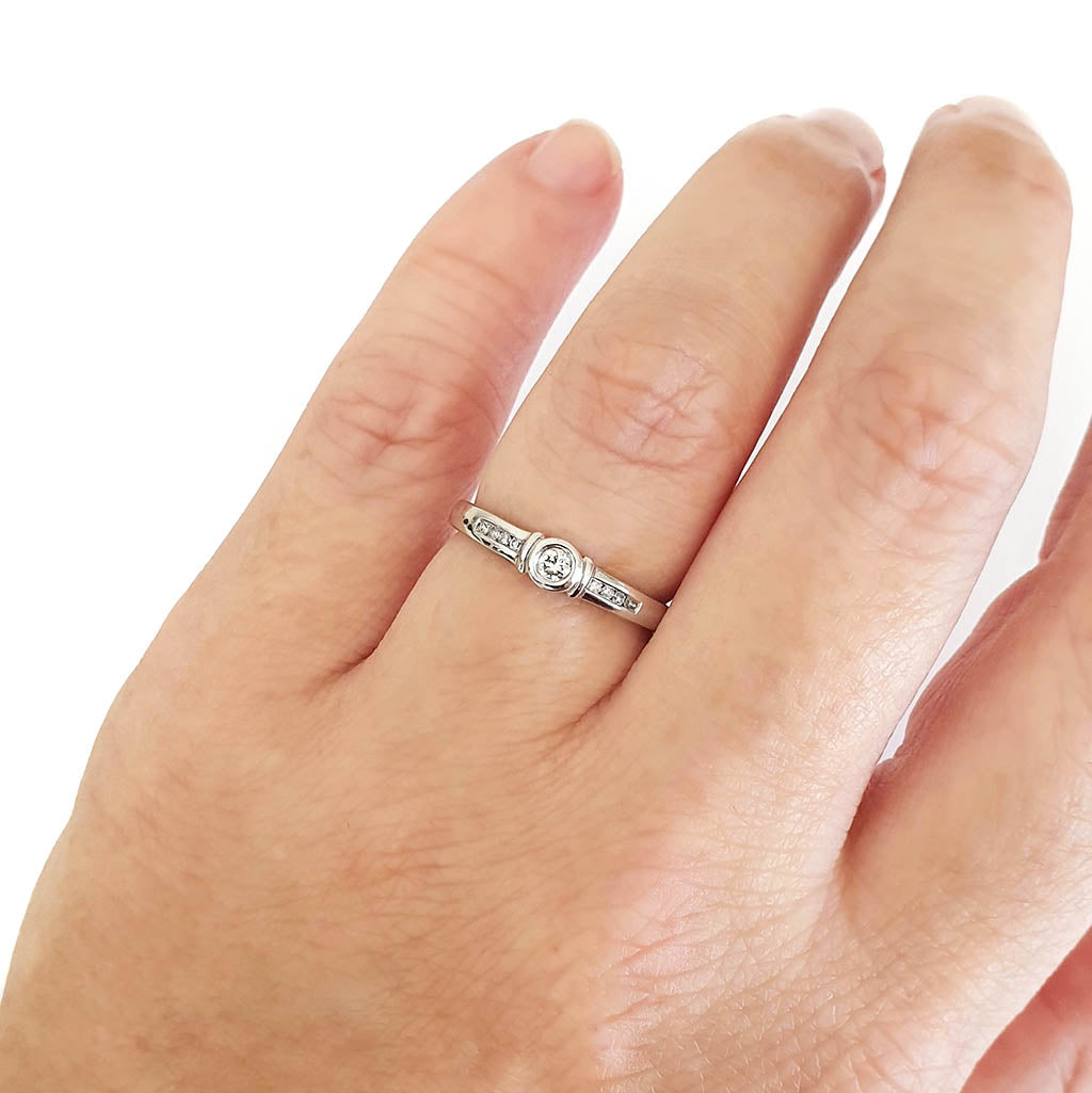 Solitaire Diamond Ring with Channel Set Diamond Shoulders