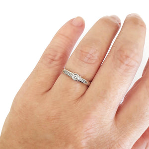 Solitaire Diamond Ring with Channel Set Diamond Shoulders