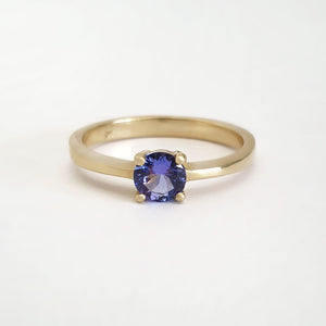 Solitaire Four Claw Round Cut Tanzanite Yellow Gold band Ring