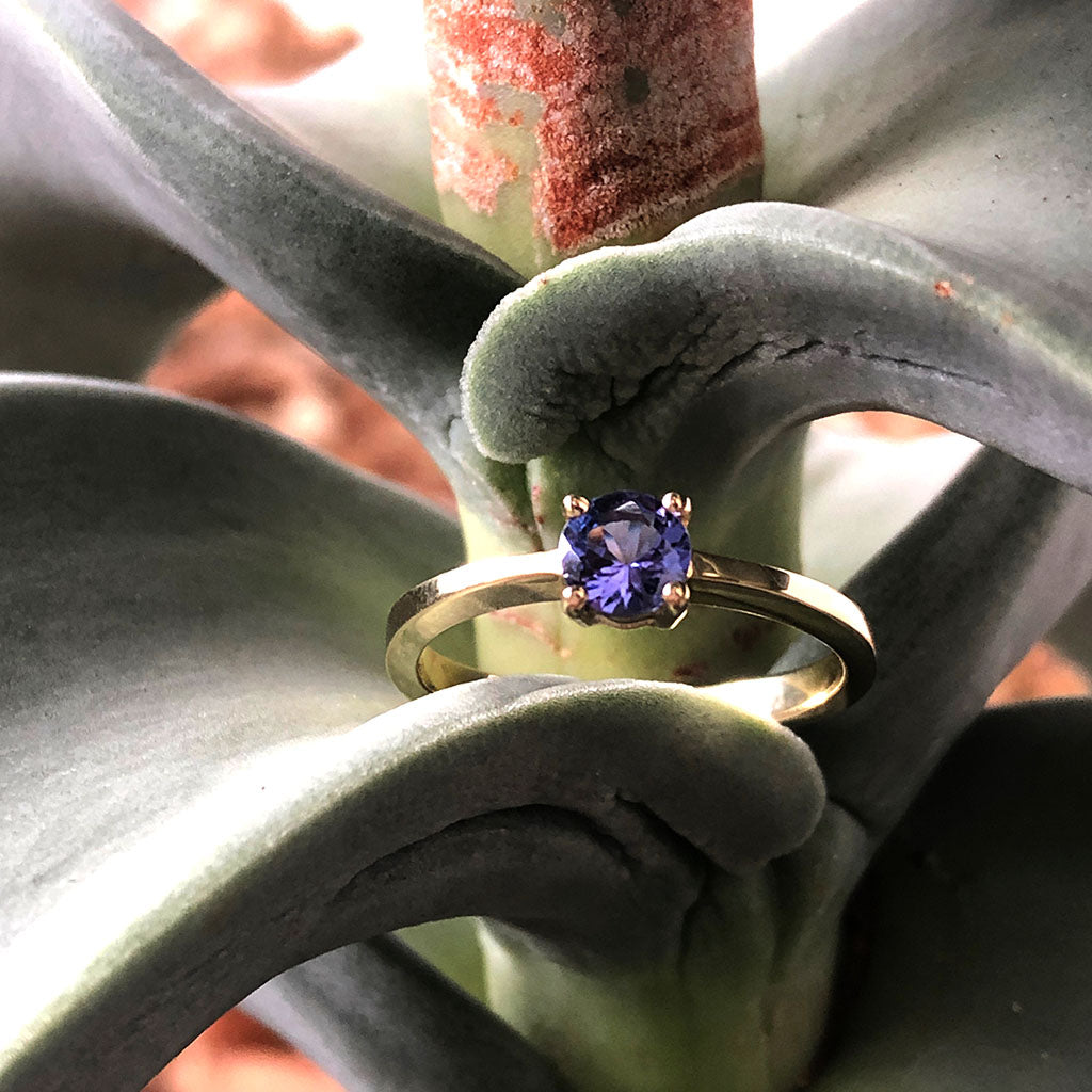 Solitaire Four Claw Round Cut Tanzanite Yellow Gold band Ring