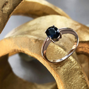 Solitaire Oval Faceted Four Claw Sapphire Ring