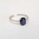 Solitaire Oval Faceted Four Claw Sapphire Ring