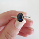 Solitaire Oval Faceted Four Claw Sapphire Ring