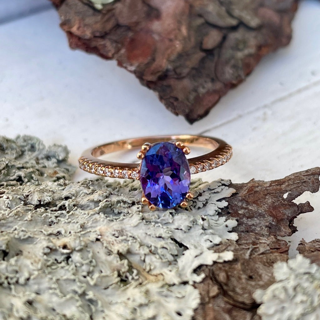 Sophisticated Oval Tanzanite with Diamond Band Rose Gold Ring
