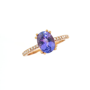 Sophisticated Oval Tanzanite with Diamond Band Rose Gold Ring