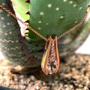 Split Rose Gold Oval Cut Morganite Pendant with Diamond Strip Highlight