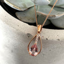 Split Rose Gold Pear Cut Morganite Pendant with Diamond Strip Highlight