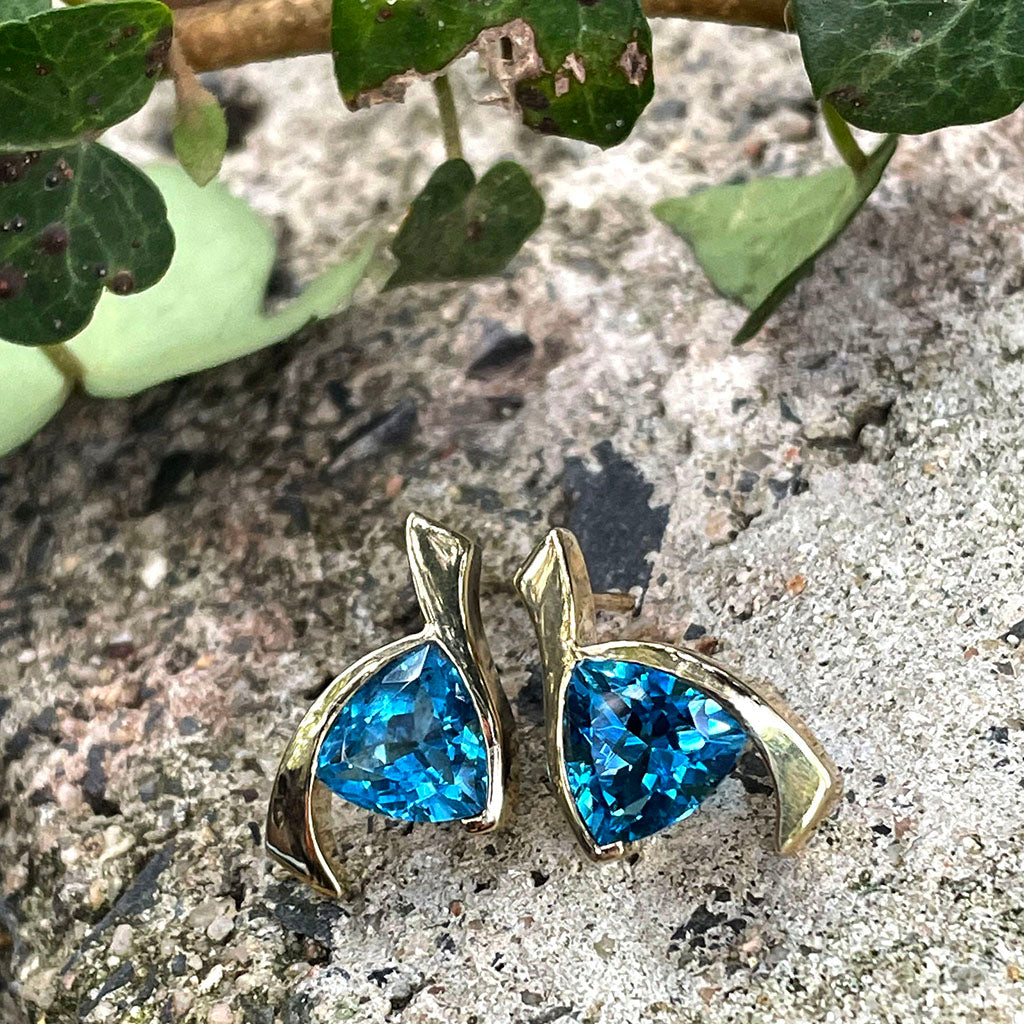 Stand Out Trilliant Cut Blue Topaz Yellow Gold Earrings