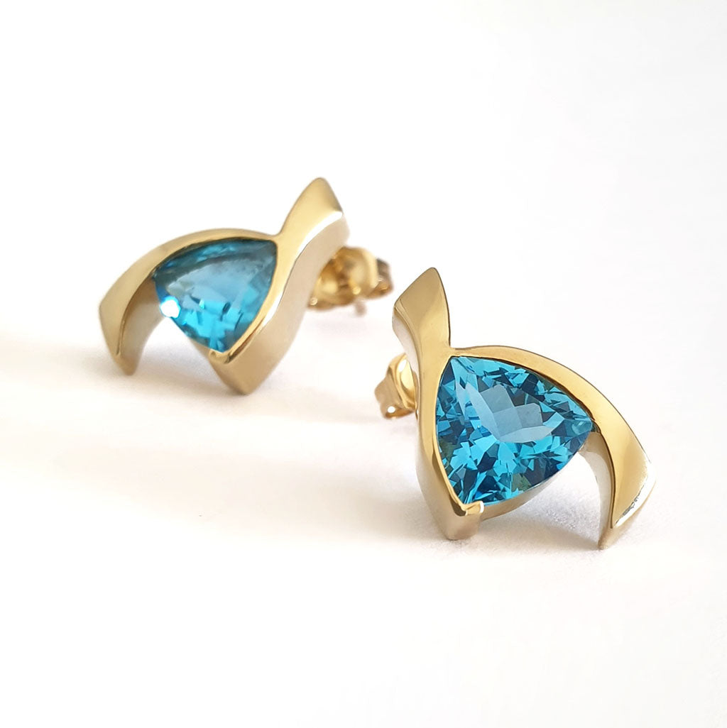 Stand Out Trilliant Cut Blue Topaz Yellow Gold Earrings