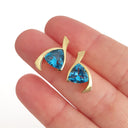 Stand Out Trilliant Cut Blue Topaz Yellow Gold Earrings