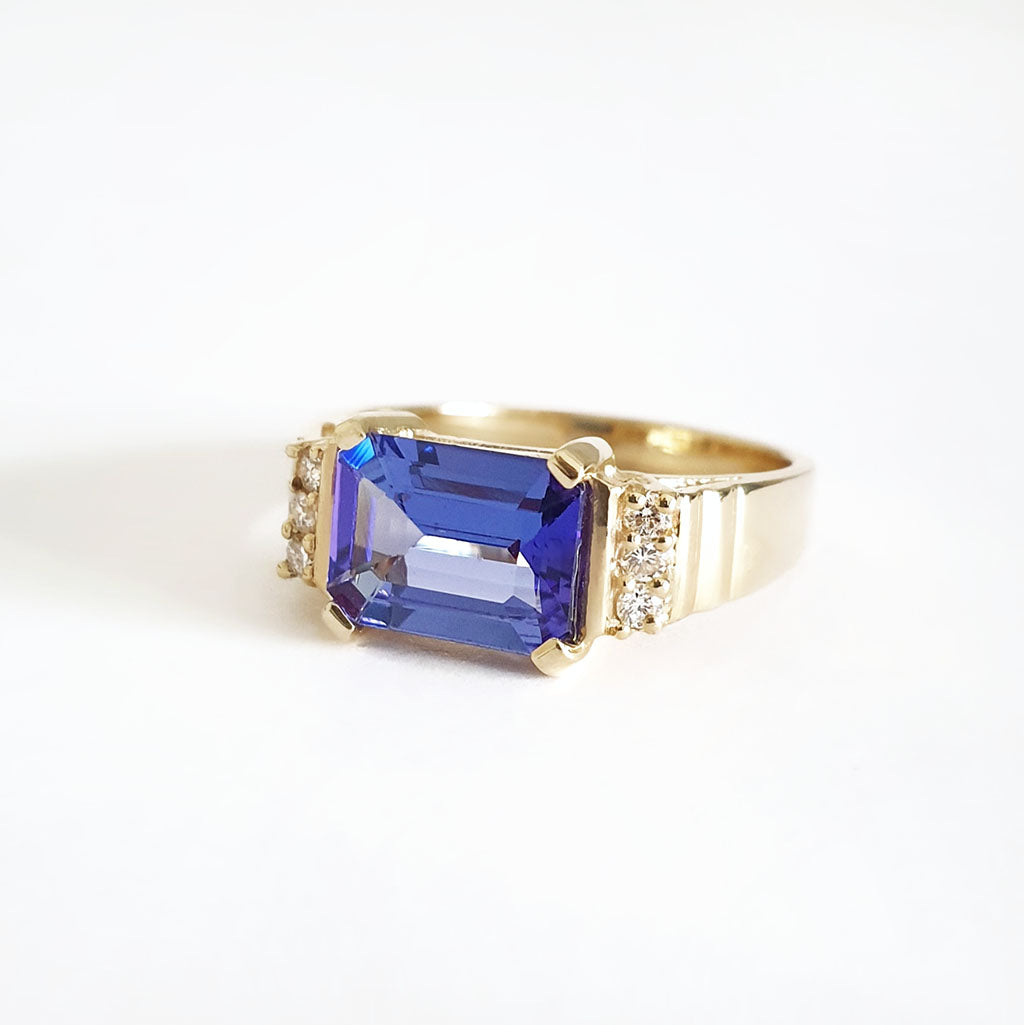 Stepped Shoulder Emerald Cut Tanzanite and Diamond Yellow Gold Ring