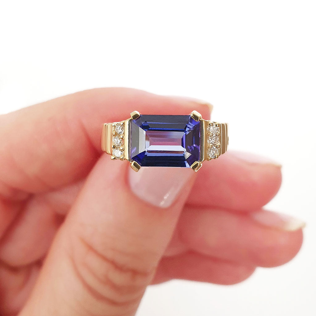 Stepped Shoulder Emerald Cut Tanzanite and Diamond Yellow Gold Ring