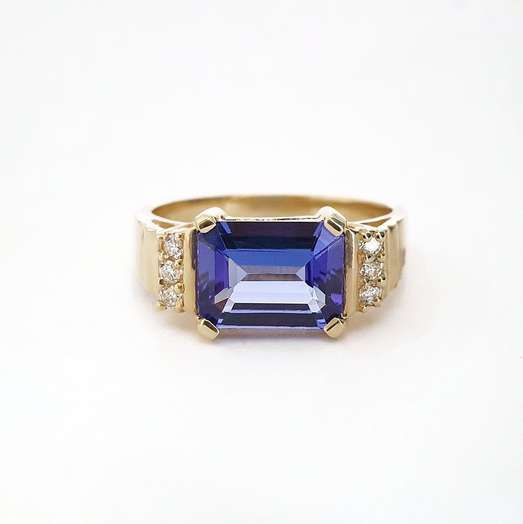 Stepped Shoulder Emerald Cut Tanzanite and Diamond Yellow Gold Ring