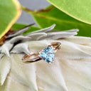 Stunning Rose Gold Solitaire Triliant Cut Aquamarine Ring