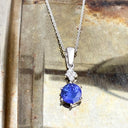 Stunning Six Claw Round Tanzanite and Quadrant Diamond Pendant