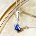 Stunning Six Claw Round Tanzanite and Quadrant Diamond Pendant