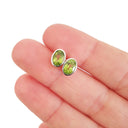 Stylish Bezel Set Oval Peridot Stud Earrings