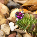 Stylish Oval Grape Garnet and Accent Diamond ring