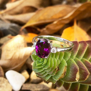 Stylish Oval Grape Garnet and Accent Diamond ring