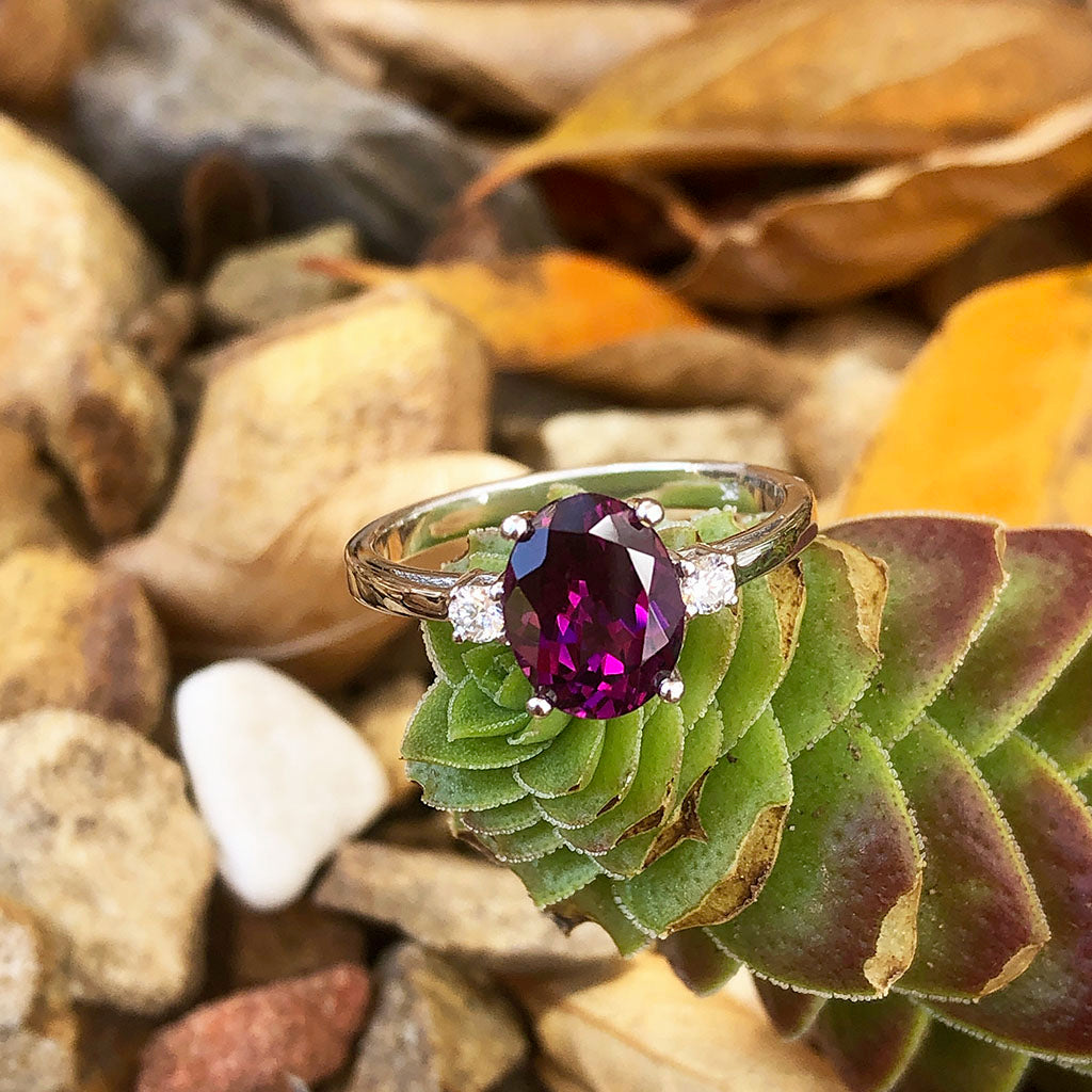 Stylish Oval Grape Garnet and Accent Diamond ring