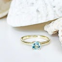 Sublime Yellow Gold Four Claw Aquamarine