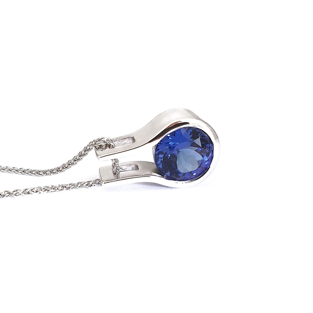 Luxurious Open Bezel Set Tanzanite Pendant