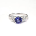 Tanzanite and Multiple Diamond Shoulder Accent Ring