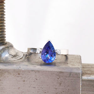 Wide White Gold Band, Pear Cut Tanzanite with Petite Diamond Accents Ring