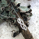 Interwoven Diamond and White Gold Pendant