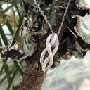 Interwoven Diamond and White Gold Pendant
