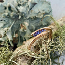 Three Stone Tension Setting Tanzanite Rose Gold Ring