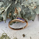 Three Stone Tension Setting Tanzanite Rose Gold Ring