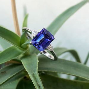 Timeless Emerald Cut Tanzanite and Petite Diamond Accent Ring