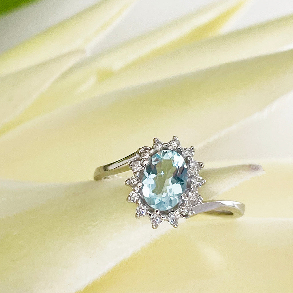 Timeless With A Twist Oval Aquamarine with Diamond Halo Ring