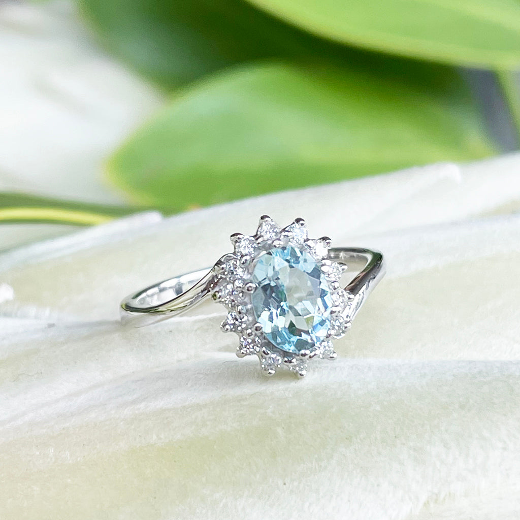 Timeless With A Twist Oval Aquamarine with Diamond Halo Ring