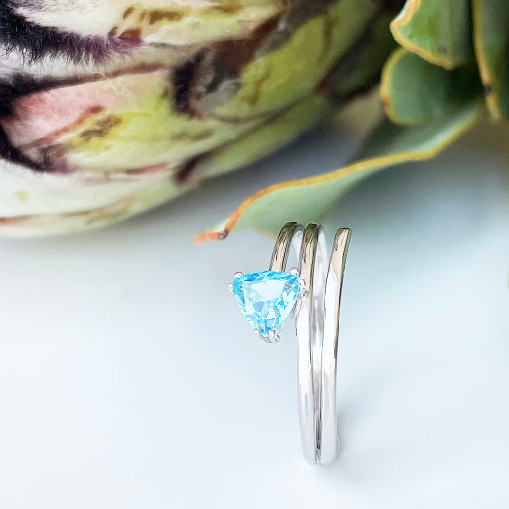 Trilliant Cut Blue Topaz Silver Wrap Around Ring