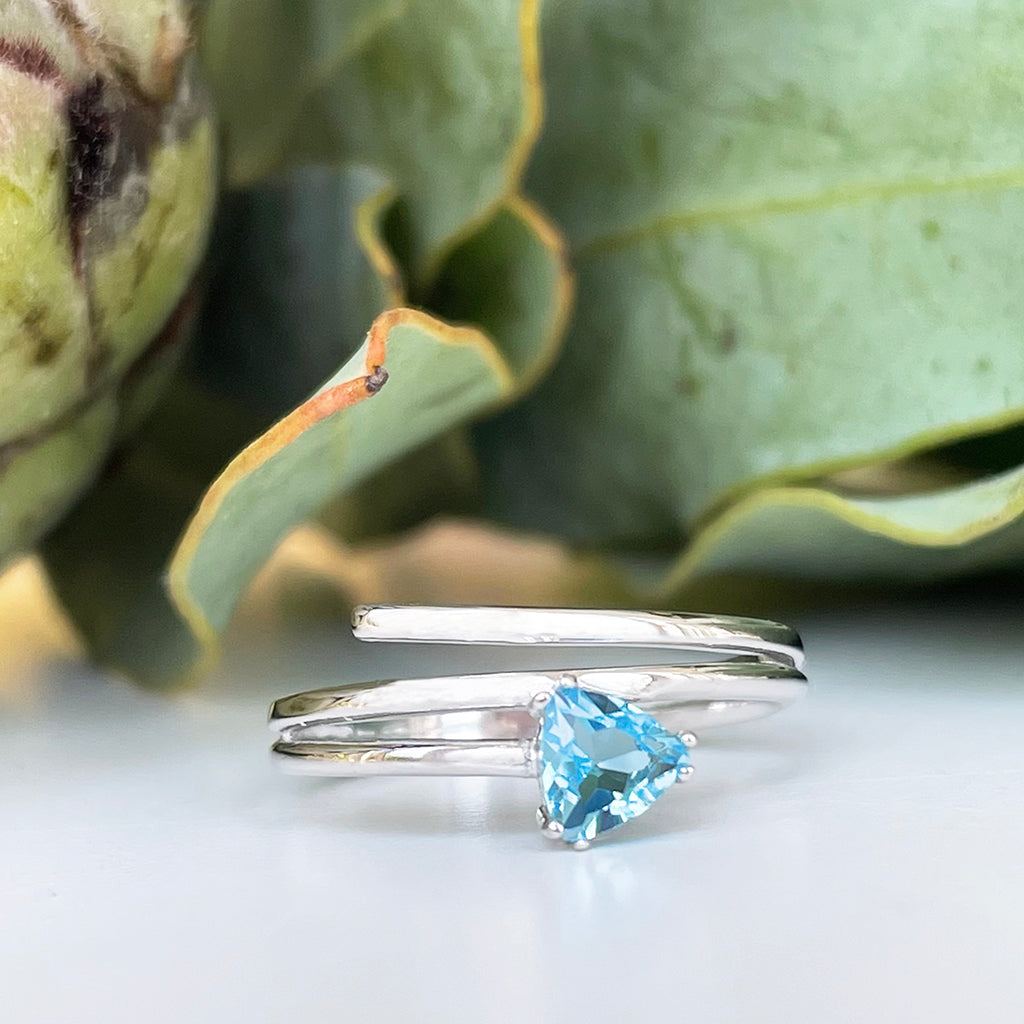 Trilliant Cut Blue Topaz Silver Wrap Around Ring