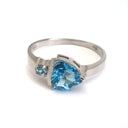 Trilliant Cut Blue Topaz With Blue Topaz Accent Ring