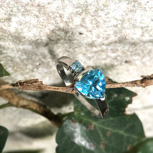 Trilliant Cut Blue Topaz With Blue Topaz Accent Ring