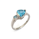 Trilliant Cut Blue Topaz With Blue Topaz Accent Ring