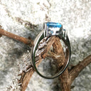 Trilliant Cut Blue Topaz With Blue Topaz Accent Ring
